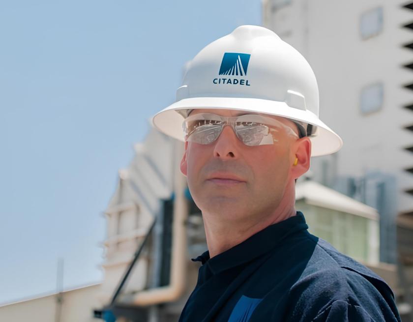 Citadel EHS field professional in hard hat at an industrial facility